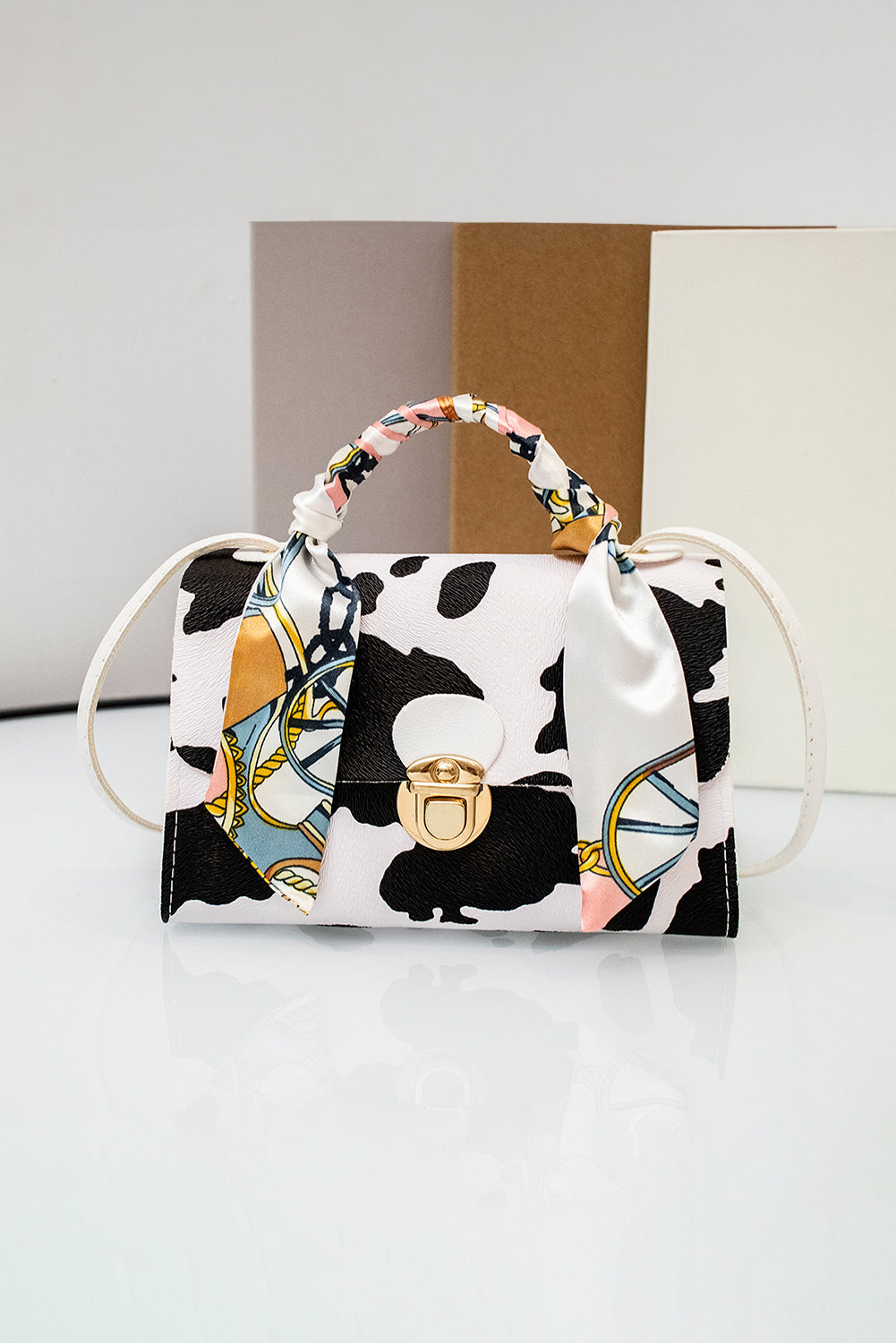 White Cow Pattern Ribbon Decor PU Leather Bag