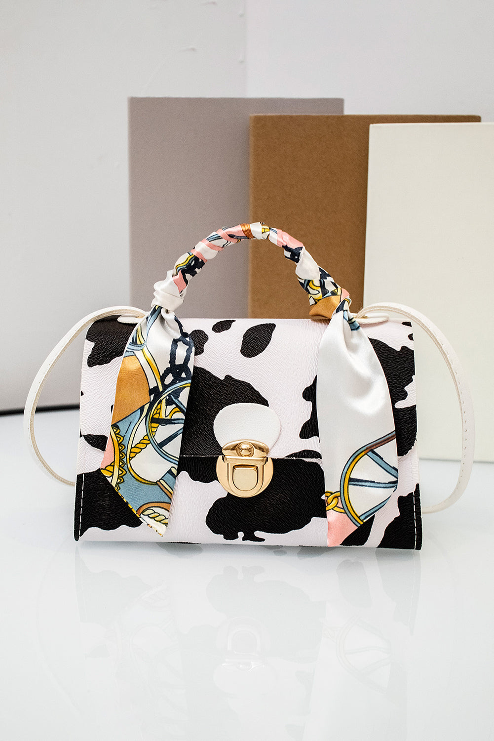 White Cow Pattern Ribbon Decor PU Leather Bag